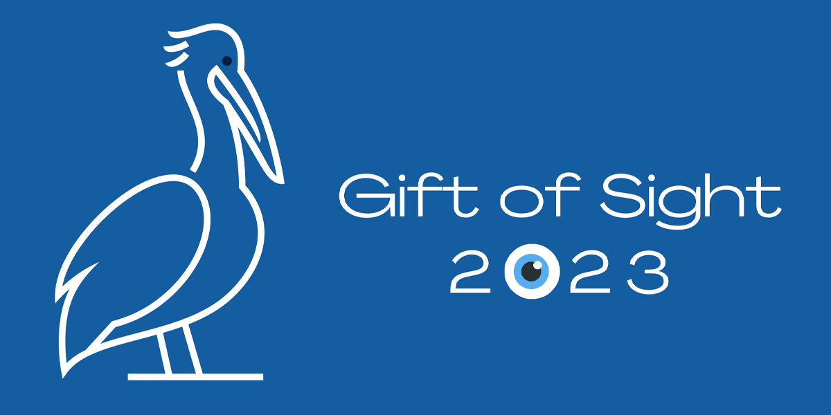 Gift of Sight 2023 blue background with white pelican and eyeball in the place of the zero in 2023